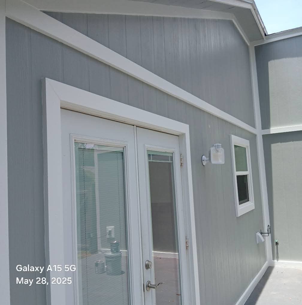 Modern vertical siding installation with contemporary design